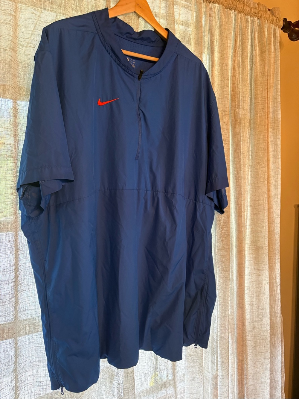 Nike Royal Blue Short-Sleeve Athletic Top with White Swoosh